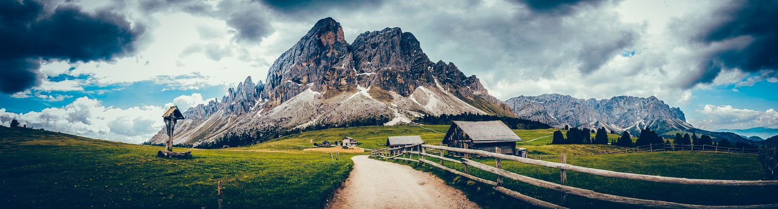 Panoramic photo with mountainous landscape and some Lightroom presets applier